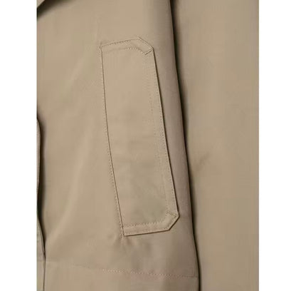 Beige buttoned cropped trench